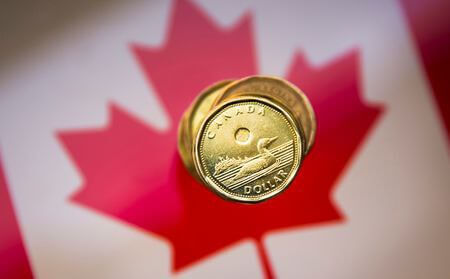 چرا دلار کانادا تضعیف خواهد شد؟